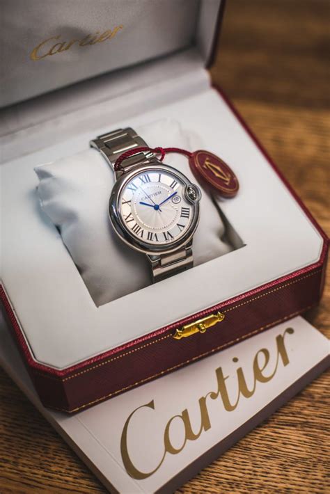 how to spot a fake cartier ballon bleu watch|cartier watch counterfeit.